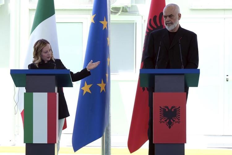 Italy's premier visits Albania as controversial plan to hold Italy-bound migrants nears its start