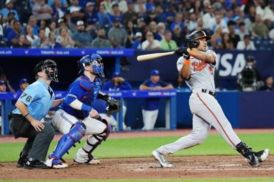 Santander has grand slam as Orioles rout Blue Jays 13-3 to spoil Ryu's return