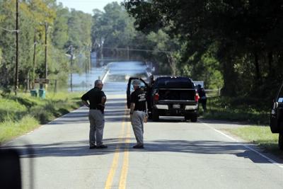 Charges dropped against deputy after 2 died in flooded van
