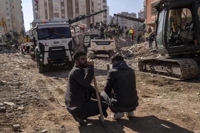 In earthquake rescues, noisy gear and digging, then silence