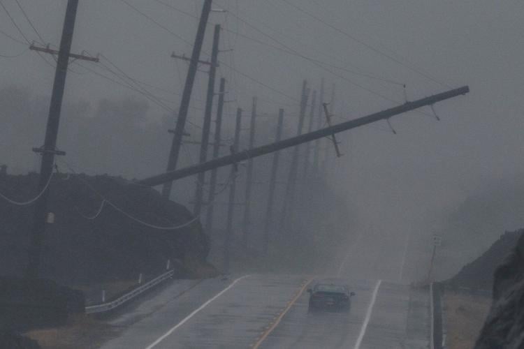 Lala is again a tropical storm, sending drenching rain and winds across the Hawaiian islands