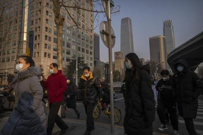 China says 200 million treated, pandemic 'decisively' beaten