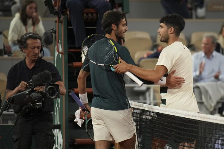 French Open: Carlos Alcaraz reaches final after Lorenzo Musetti retires with injury in fourth set
