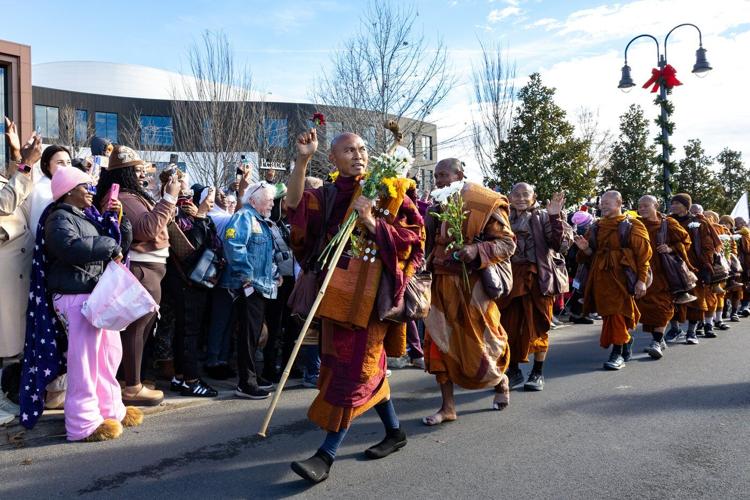 Buddhist monks persist in peace walk despite injuries as thousands follow them on social media