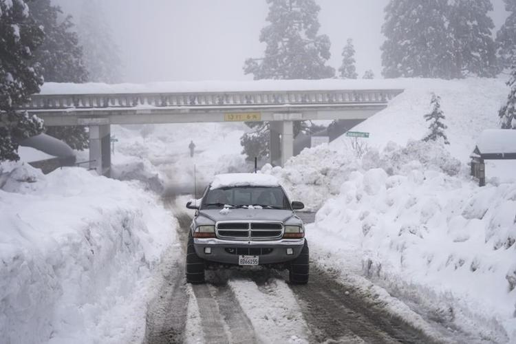 To the rooftops: Staggering snowfall in California mountains