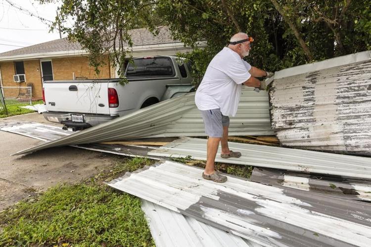 Francine weakens moving inland as the storm leaves behind flooding and widespread power outages