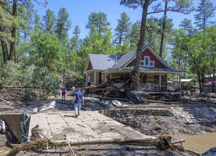 New Mexico mountain village braces for more rain following deadly flash flooding