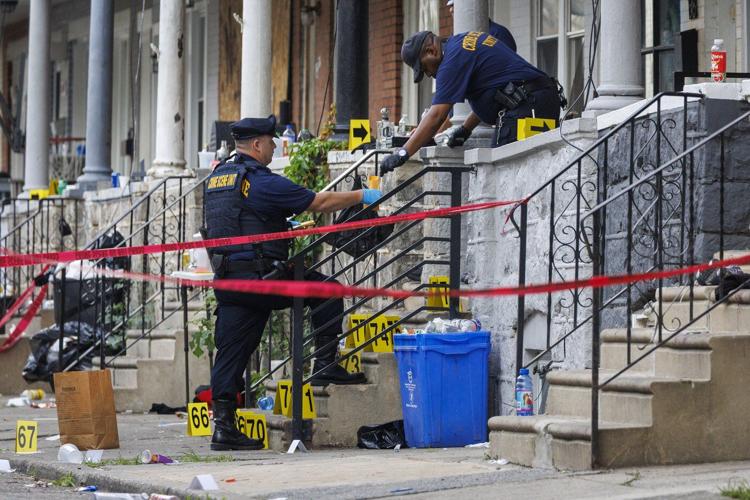 3 dead, 10 injured in South Philadelphia shooting and a person is in custody, police say