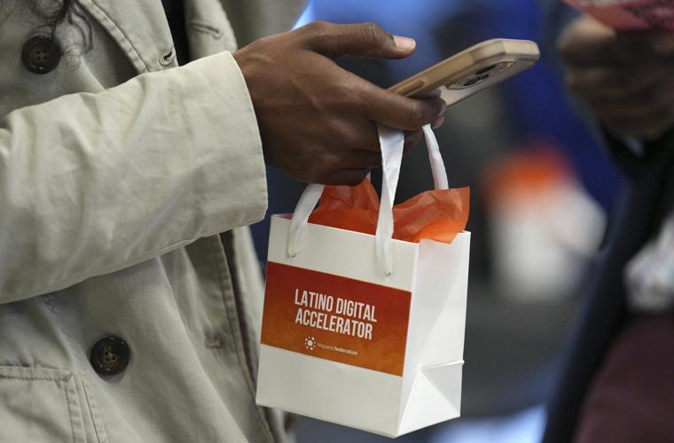 Latino workers working to overcome a technological divide brought on by automation, AI