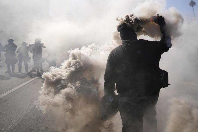 AP PHOTOS: Protesters clash with law enforcement in Los Angeles