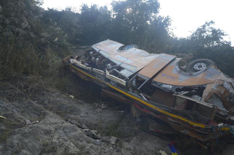 A packed bus plunges off a Nepal highway, killing 19 and injuring 25
