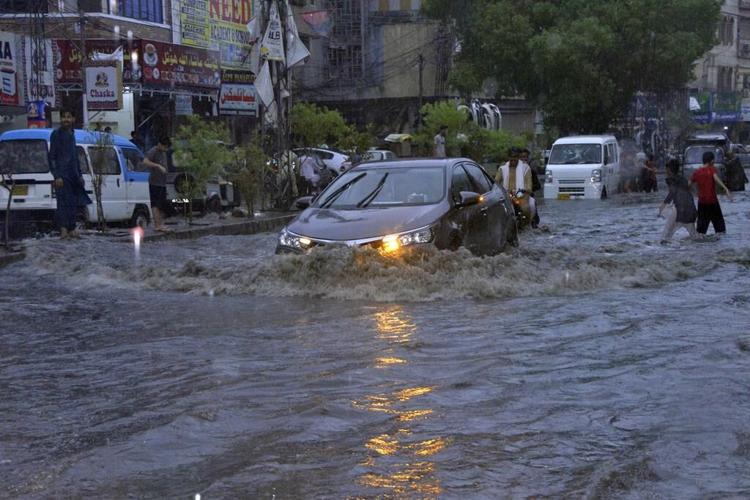 Landslides block key roads in northern Pakistan, as the death toll from monthlong rains rises to 133