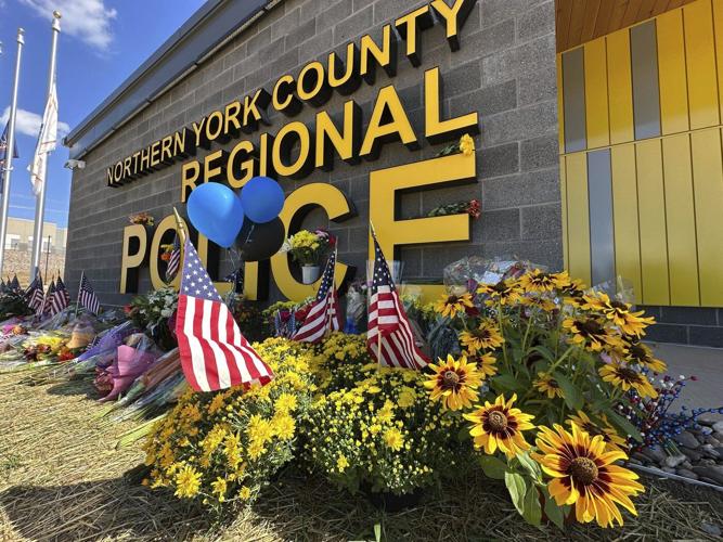 Pennsylvania detectives killed in an ambush are remembered for saving lives and helping others