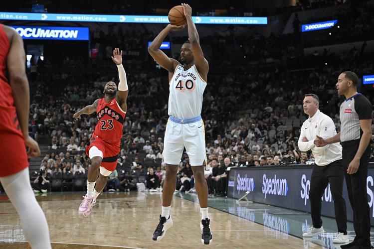 Spurs rally from a 22-point deficit to beat the Raptors 125-118