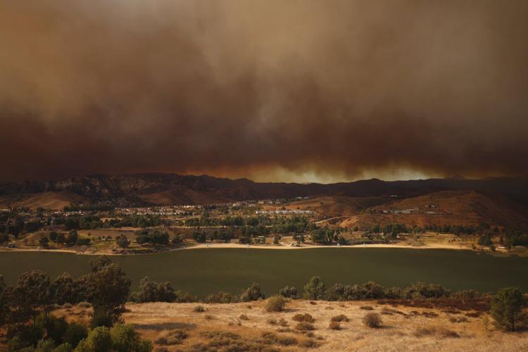 Over 50,000 under evacuation orders or warnings as wildfire imperils homes north of Los Angeles