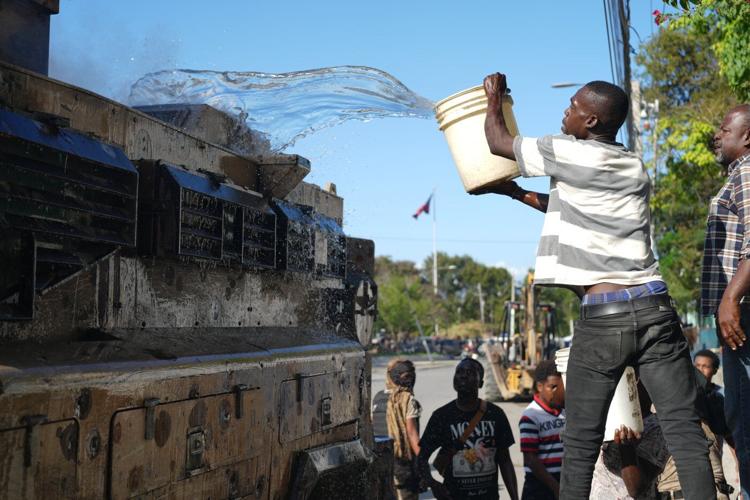 Under fire in Haiti: Veteran AP cameraman tells the story