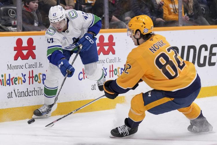 Linus Karlsson gets 1st NHL goal as Canucks beat Predators 3-1