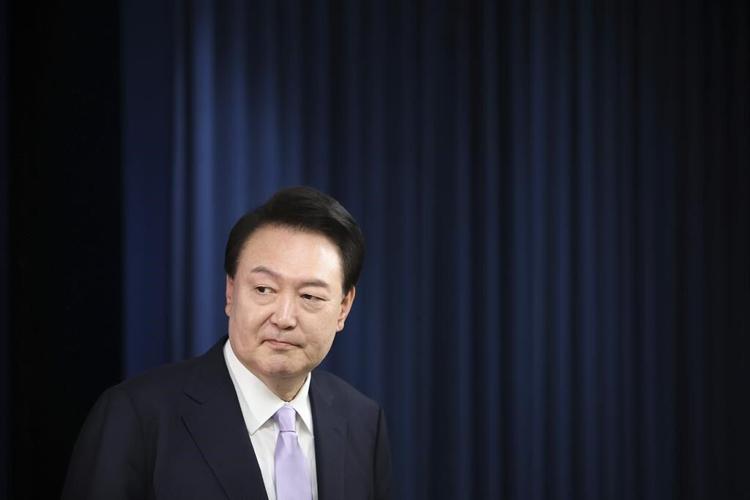 South Korea's president denies wrongdoing in a growing scandal