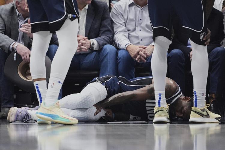 Mavericks star Kyrie Irving has a torn ACL and is out for the season