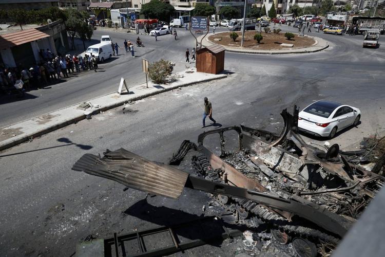 In Syria’s Sweida, the stench of death still lingers days after sectarian bloodshed