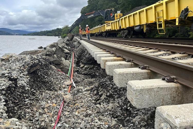 A surging river threatens Vermont's capital as crews rescue more than 100 from swift water