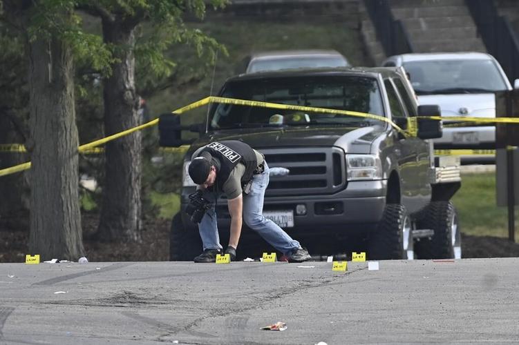 Parking lot party shooting leaves 1 dead and 19 people hurt in suburban Chicago