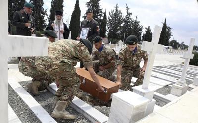 Families reclaim the remains of 15 recently identified Greek soldiers killed in Cyprus in 1974