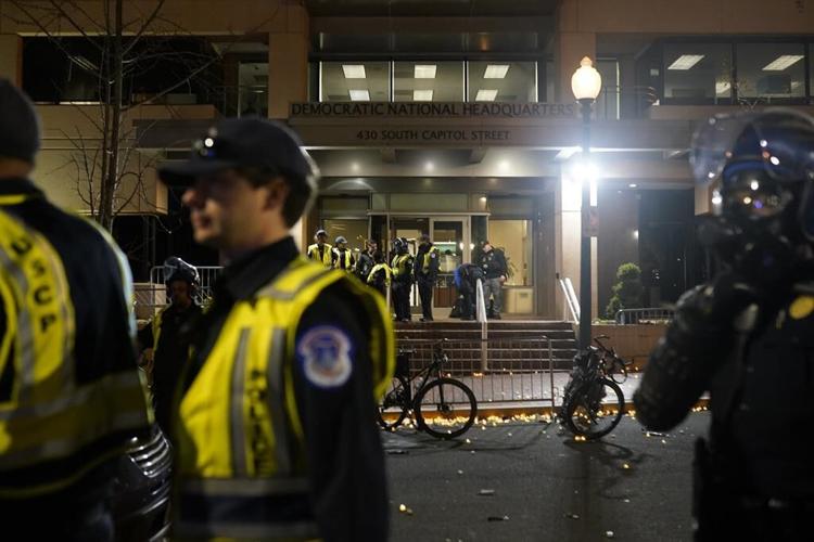Police and protesters clash outside Democratic HQ during demonstration over the Israel-Hamas war