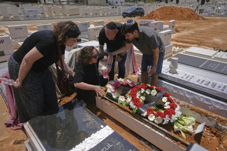 The Latest: Iran's supreme leader rejects call to surrender as Israel strikes Tehran