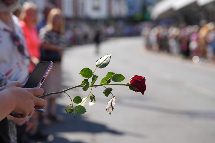 Bonnie Tyler fans line the streets of a Welsh village as her coffin is brought home