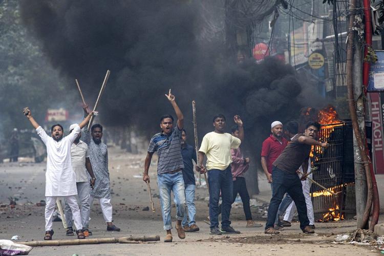 Bangladesh struggles to contain the fallout of an uprising that toppled its leader last year