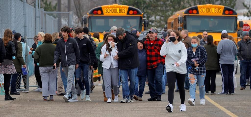 Prosecutor tells jury that mother of Michigan school shooter is at fault for 4 student deaths