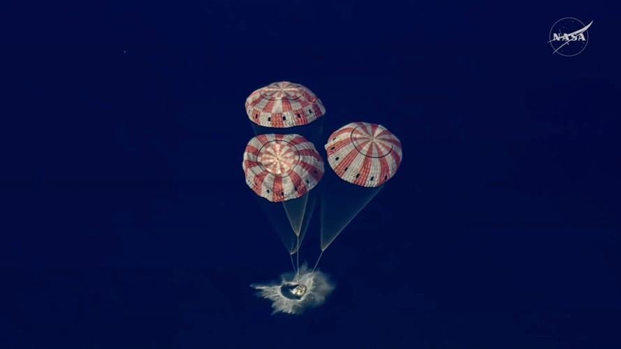 Canadian Jeremy Hansen, Artemis II crew splash down in Pacific after moon trip