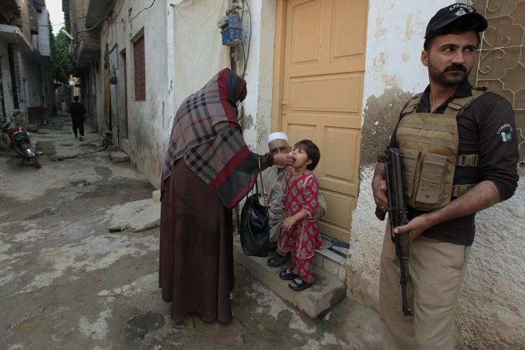 Attack on a health center dealing with polio in northwestern Pakistan kills a police officer