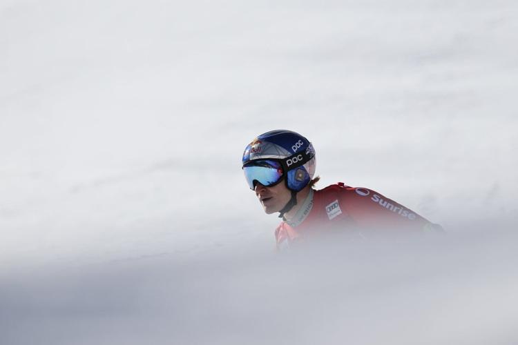Swiss skier Marco Odermatt takes eventful World Cup super-G for 1st win in Kitzbuehel