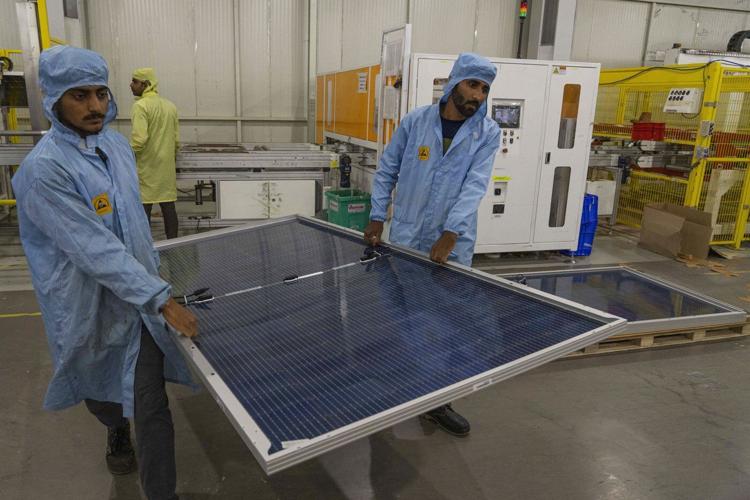 UN says booming solar, wind and other green energy hits global tipping point for even lower costs