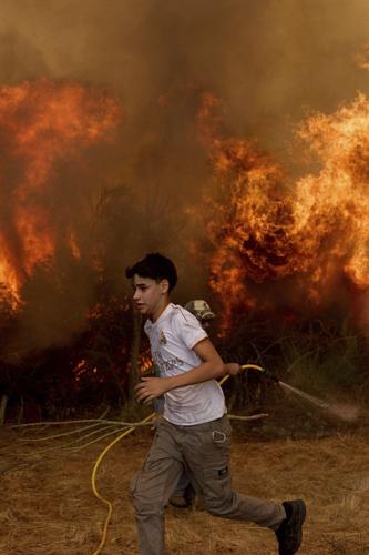 Spain battles record fires even as end of heatwave brings lower temperatures