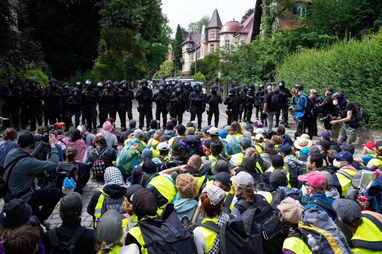 Far-right Alternative for Germany party reelects leaders as protesters and police clash