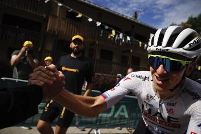 Pogacar attacks in the Tour de France's first big mountain stage and reclaims the yellow jersey