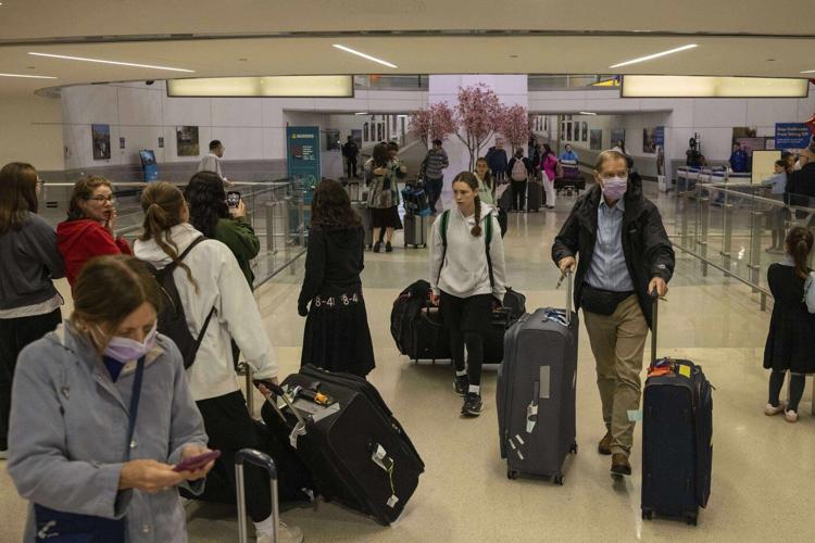 Trump's new travel ban takes effect as tensions escalate over immigration enforcement