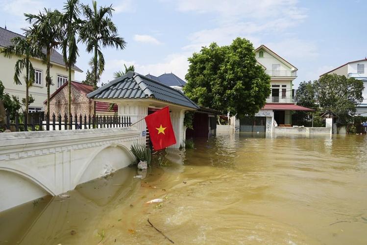 Vietnam typhoon death toll rises to 233 as more bodies found in areas hit by landslides and floods