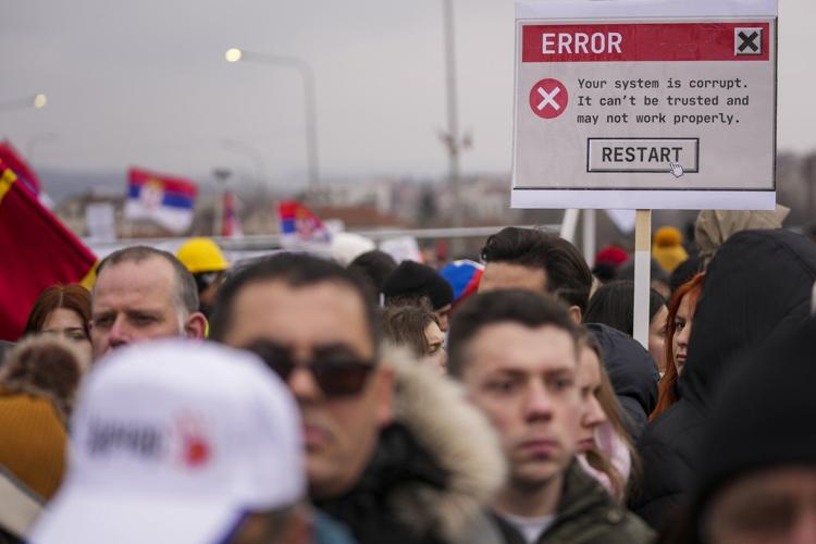Serbia's striking students and populist president hold parallel rallies as tensions spike