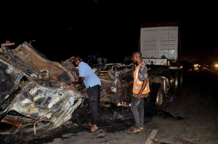 At least 6 people killed when a trailer crashed into vehicles and burst into flames in Nigeria
