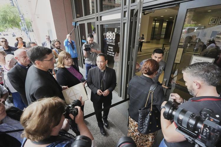 San Diego clergy visit federal immigration court to bear witness during crackdown on migrants