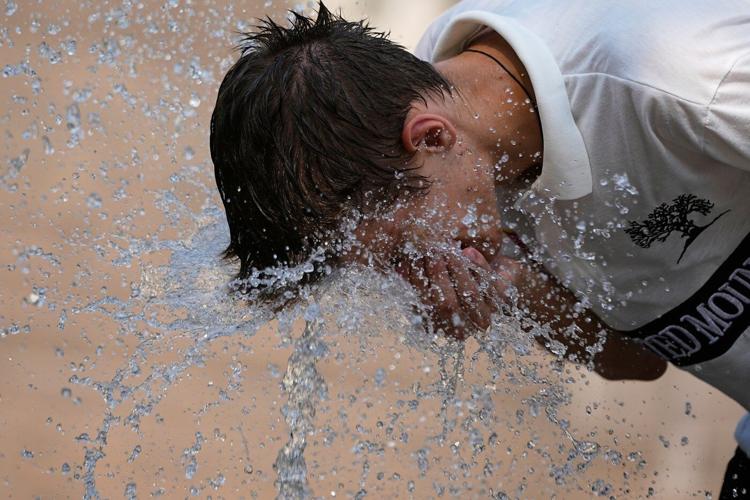 Scientists call another near-record hot year a 'warning shot' of a shifting, dangerous climate
