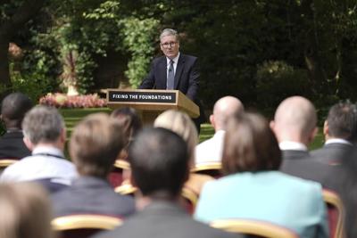 UK prime minister contrasts his leadership with the past but warns of painful choices ahead