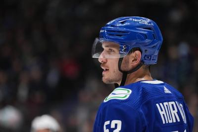 Canucks' captain Bo Horvat trying to focus on hockey as trade talk swirls