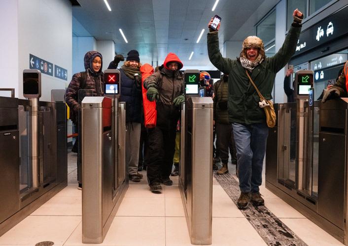 Cheering crowds mark opening of Toronto's long-delayed Eglinton Crosstown LRT