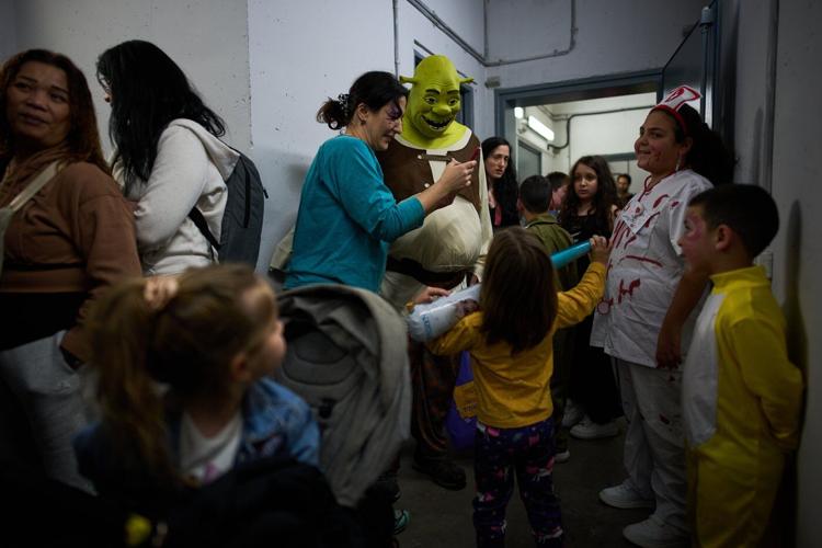 Purim parties shift to bomb shelters as Israelis celebrate under Iran war threat