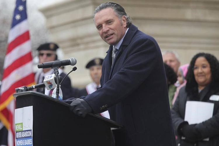 Governor decries 'distracting' Kansas with 'wedge issues'